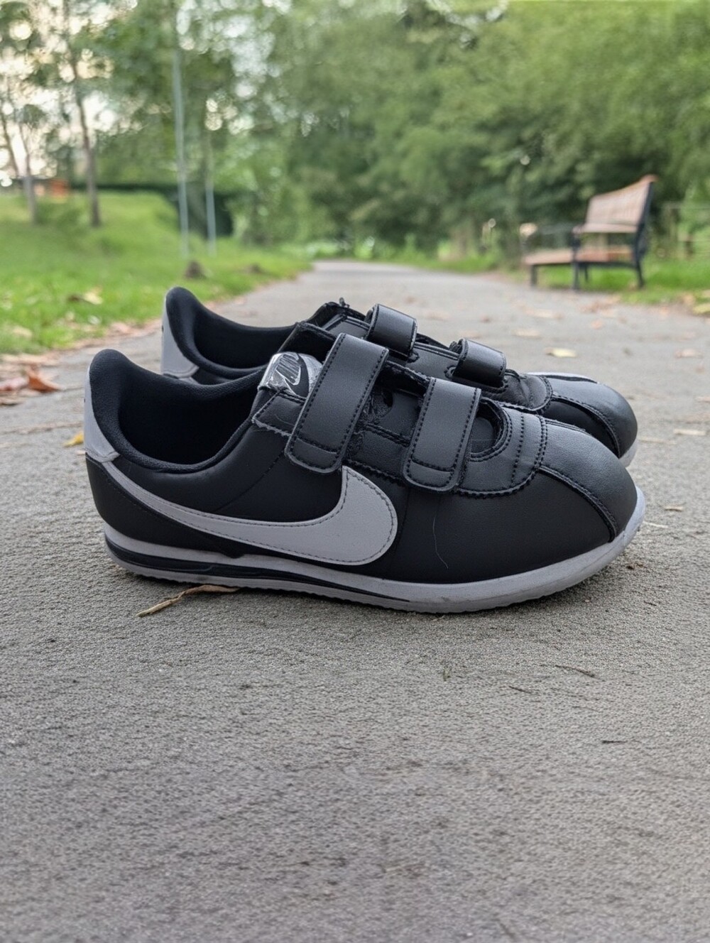 Nike Kids Black Sneakers with White Swoosh and Velcro Straps